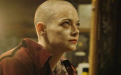 Portada del artículo de crítica para la película "Bugonia" de Yorgos Lanthimos, con Emma Stone y Jesse Plemons.